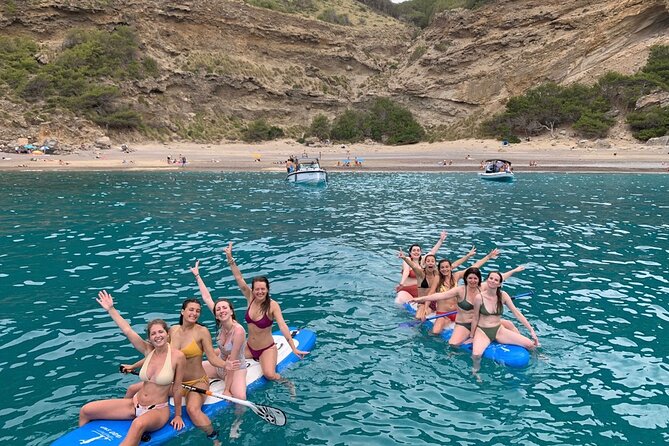 Mallorca Beach & Caves 4hr Boat Trip Drinks, Tapas, SUP & Snorkel - Alcanada Lighthouse and the second water stop