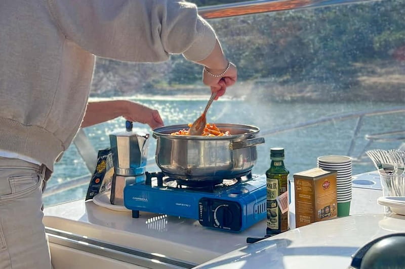 Mallorca: Private Watersports Boat. LUNCH Drinks SUP, Tubing - Who will get the most from this charter