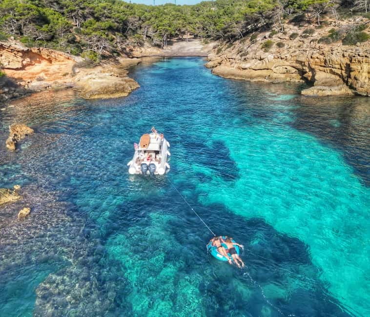 Mallorca: Private Watersports Boat. LUNCH Drinks SUP, Tubing - Punta Negra and the first run along the coast