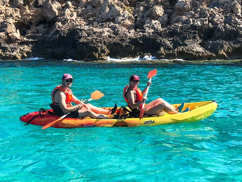 Mallorca: Sea Caves Kayaking Tour, Snorkeling & Snack - Inside the caves and along the rock walls