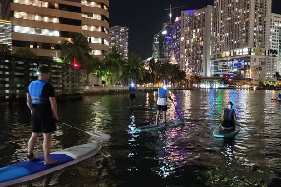 Miami: City Lights SUP or Kayak Night Tour - City lights, yachts, and waterfront food