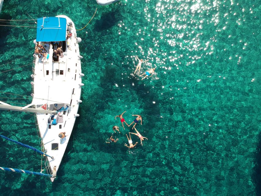 Milos: Milos and Polyaigos Snorkeling and SUP Cruise - Sykia Cave and the volcanic coast