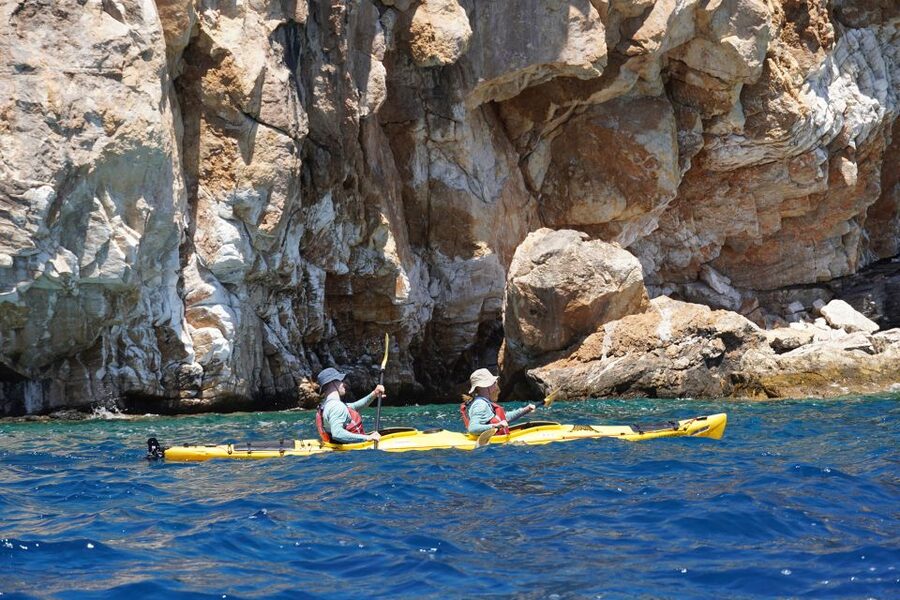 Naxos: Rina Cave Sea Kayak Tour with Snorkeling and Picnic - Entering Rina Cave and swimming above it