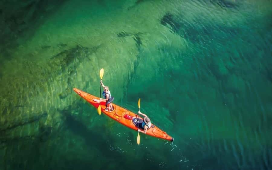 Nelson: Abel Tasman Kayaking & Great Taste Trail Bike Tour - Morning kayaking toward Split Apple Rock