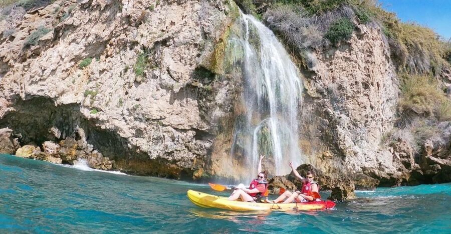Nerja: Guided Kayak Tour Nerja Cliffs and Maro Waterfall - Entering the caves and small bays
