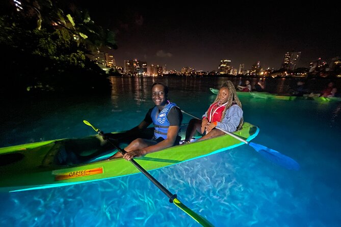 Night Kayak - Condado City Lights Tour - Paddle under a historic bridge and around the lagoon