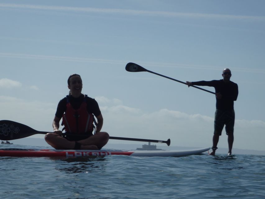 Oeiras Coast: Stand Up Paddleboarding near Lisbon - Learning to stand before you paddle away