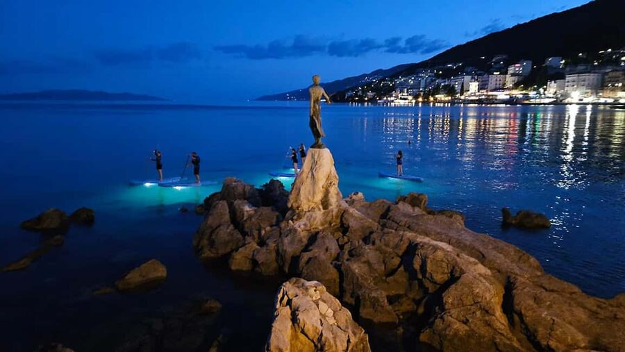 Opatija: Guided SUP Paddleboarding Adventure at Night - Paddling into the illuminated bay