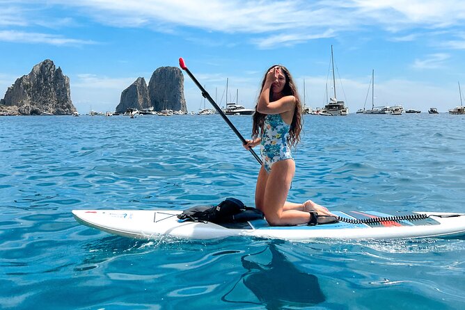 Paddleboard in Capri between caves and beaches. Photos included! - Guides, group size, and the feel of the outing