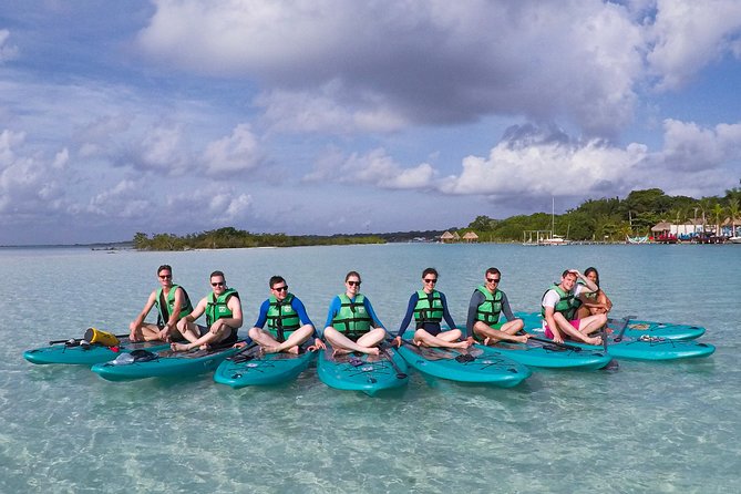 Paddleboarding and/or kayaking tour at sunrise in the lagoon of Bacalar - Cenote de la Bruja, the Tour’s Main Stop