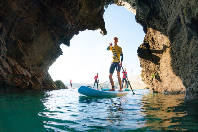 Paddleboarding Around Newquay's Coastline - Your first lesson: knees before standing
