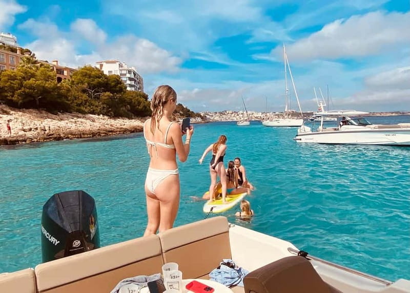Palma de Mallorca: Private Boat Tour with Snorkel and Paddle - Snorkeling, swimming, and the underwater camera