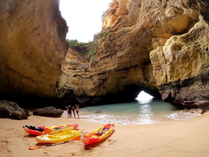 Portimão: Benagil Caves Speedboat and Kayak Guided Tour - Entering Benagil Cave by double kayak