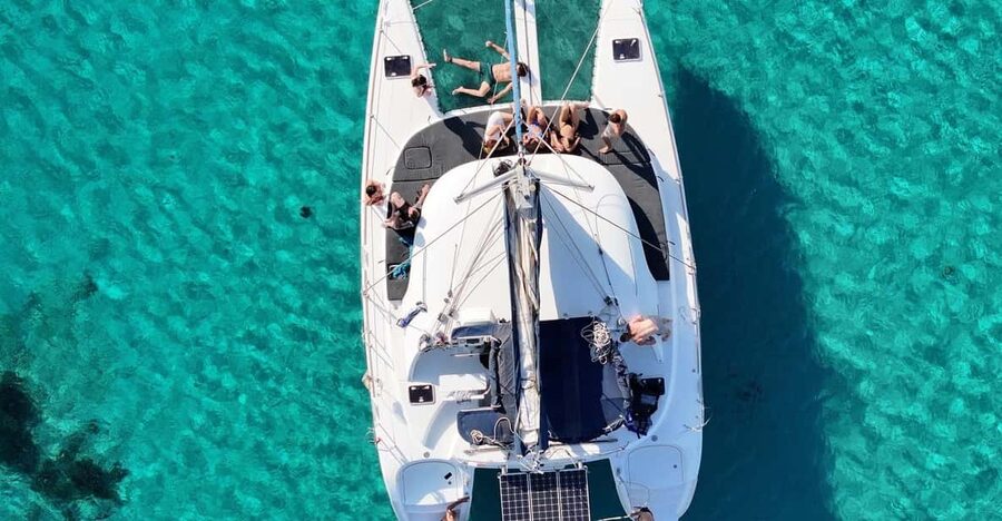 Private Catamaran Cruise Mykonos Delos with Meals & SUP - Rhenia’s quiet cove and time in the water