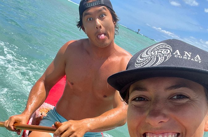Private Outrigger Canoe Surfing Experience - Catching waves near Honolulu