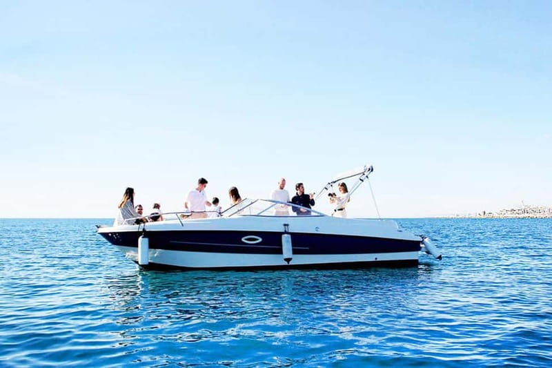 Puerto Banús: Floky Boat Cruise with Snorkeling & Paddle SUP - Swimming and paddleboarding in the open water