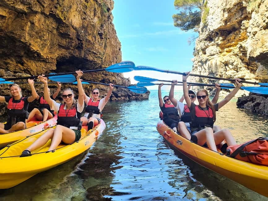 Pula: Cave Kayak Tour, Snorkeling and Island Jumping - Paddling the open water toward the cave