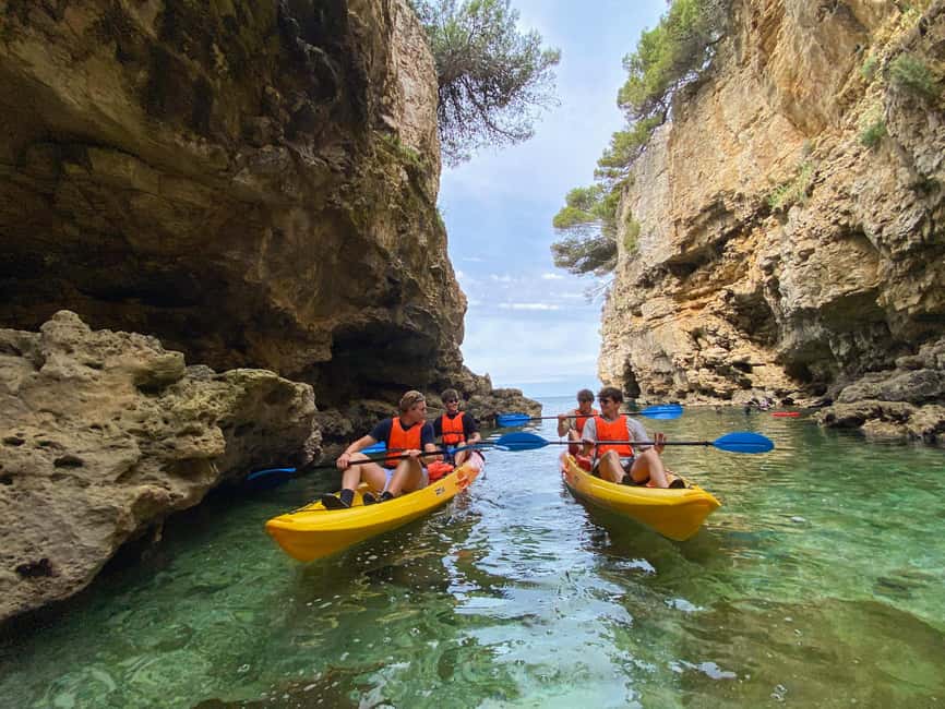 Pula: Cave Kayak Tour, Snorkeling and Island Jumping - Snorkeling in clear water