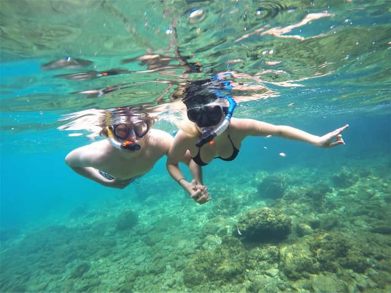 Pula: Cave Kayak Tour, Snorkeling and Island Jumping - Exploring the pigeon cave and rocky canyon