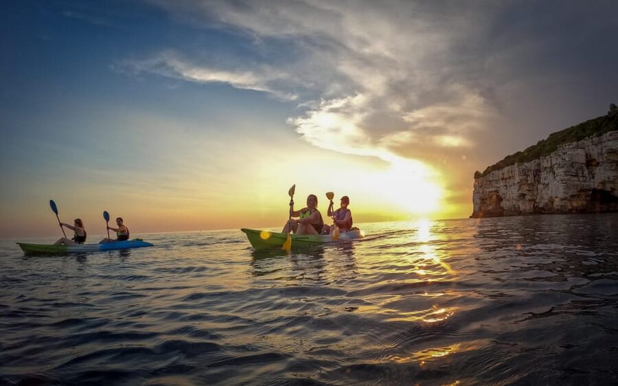 Pula: Kayaking,Snorkeling, Cliff jumping Tour with Wetsuit - Paddling the coast for the first 30 minutes