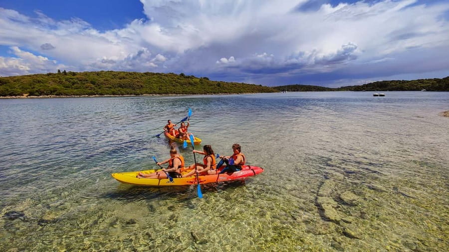 Pula: Muzil Canyon Kayak Tour, Snorkeling and Cliff Jumping - The guides and group experience