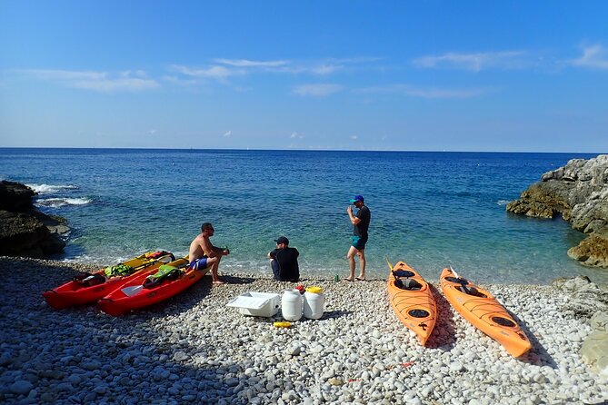 Pula: Sunset Adventure – Boat, Kayak, Snorkeling & Sunset - The sunset from a secluded beach