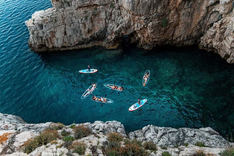 Pula: Sunset/Night Illuminated Transparent Kayak Tour - From Valovine Beach to open water