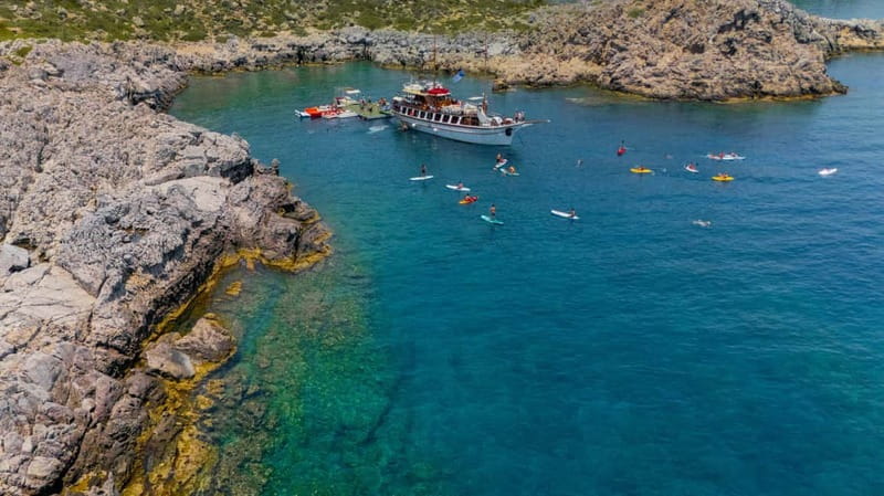 Rhodes: Gulet Trip with Food, Drinks, SUP, Kayak & Swimming - Ladiko’s Fun Island is the active heart of the day