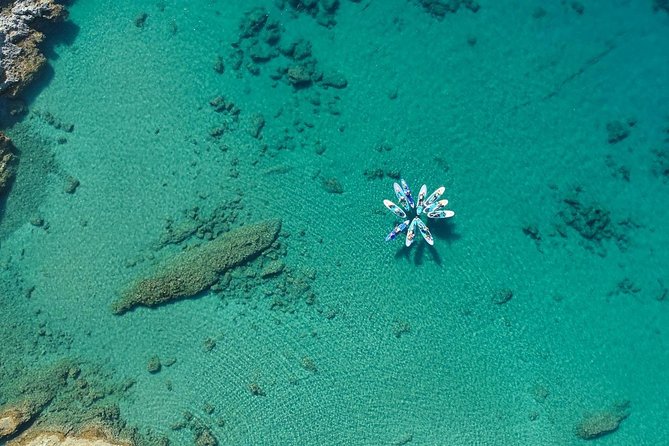 Rhodes: Stand Up Paddle & Snorkel Adventure - Paddling beside the cliff-lined coast