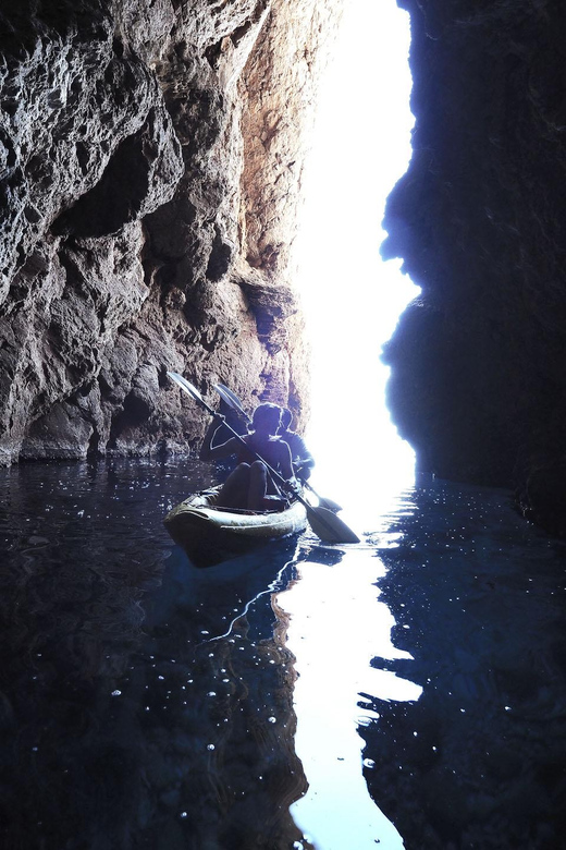 Sant Elm: Guided kayak tour to Cala en Tío with caves - Entering the sea caves near Cala en Tió