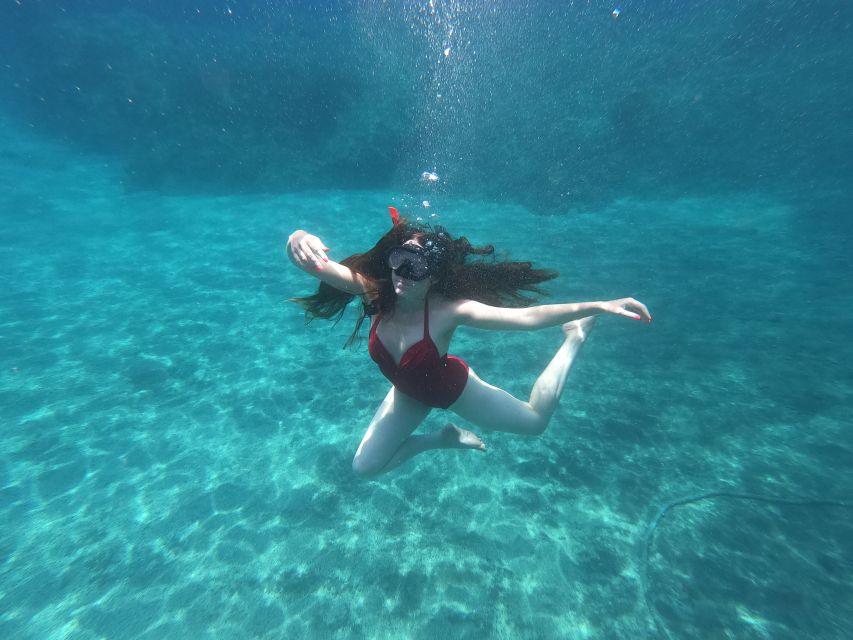 Santorini: Sea Caves Kayak Trip with Snorkeling and Picnic - Key points at a glance