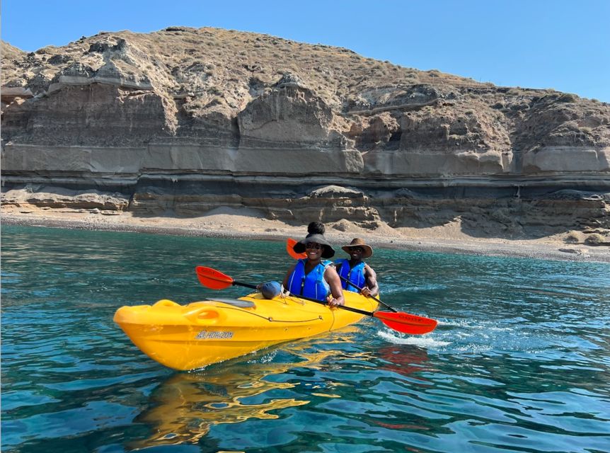 Santorini: Sea Caves Kayak Trip with Snorkeling and Picnic - Inside the caves and around Black Mountain