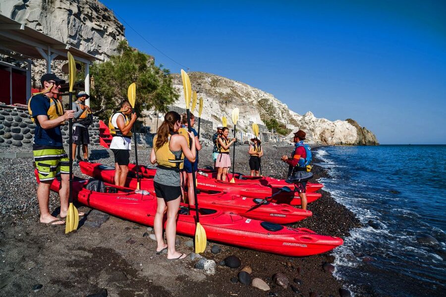 Santorini: Sea Kayaking with Light Lunch - Black Mountain, rock houses, and the first cave