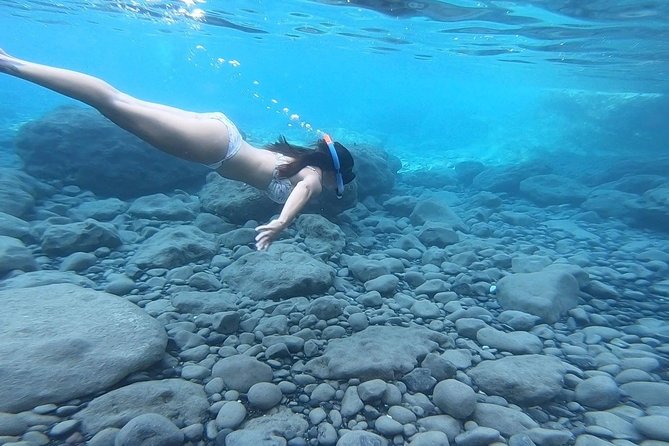 Santorini: Stand-Up Paddle and Snorkel Adventure - Learning to stand, paddle, and fall in