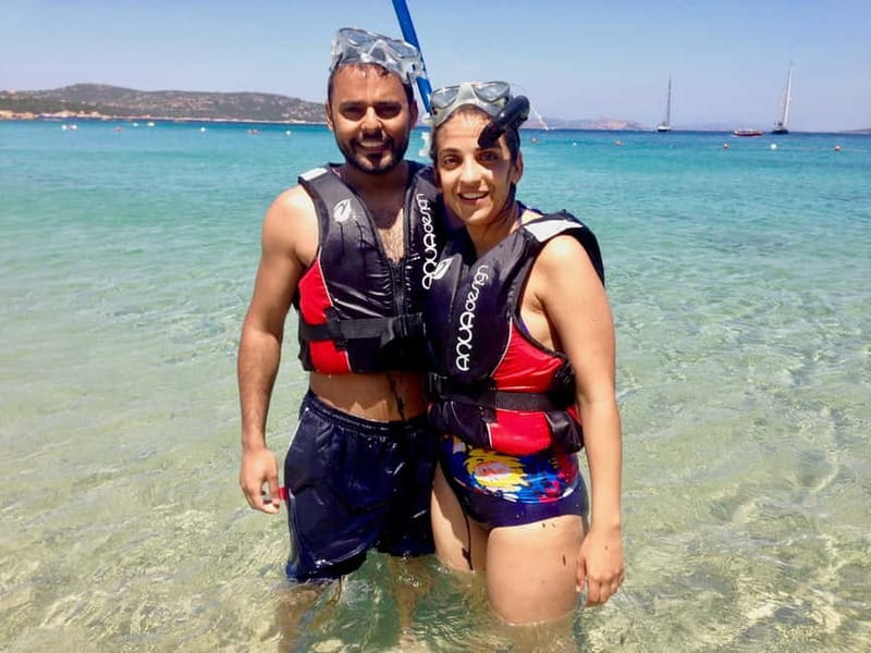 Sardinia: Morning Kayak Tour + Snorkeling and Local Aperitif - Languages, guides, and the feel of the outing