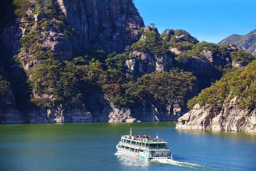 Seoul: Chungju Cruise, Cable Car & Cave Kayak Adventure Tour - Cruising Chungju Lake among cliffs and islands