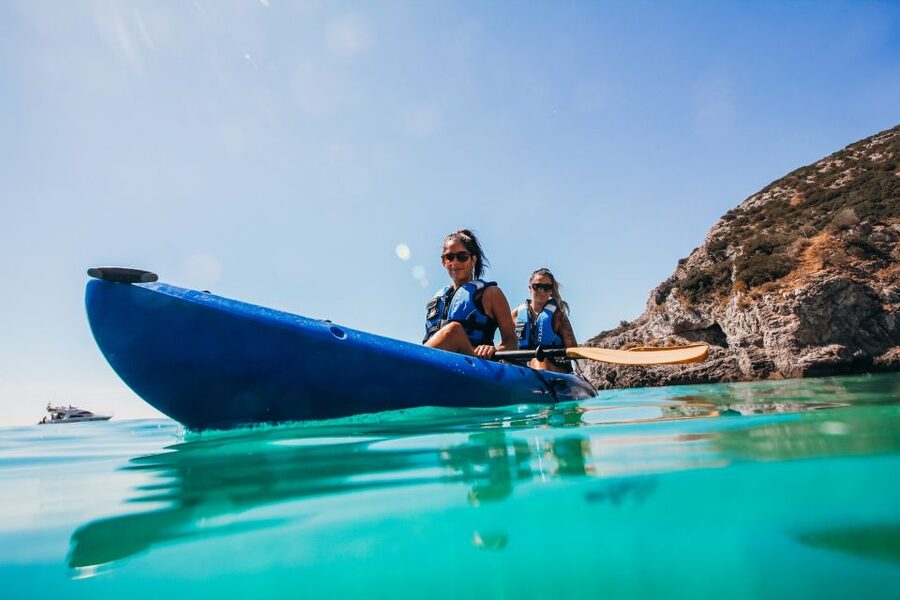 Sesimbra: Arrabida Natural Park & Caves Guided Kayaking Tour - Meeting at the blue kayaks in Sesimbra