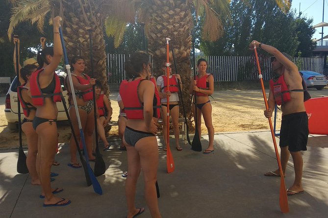 Seville Paddle Surf Sup in the Guadalquivir River - The bullring, Triana Bridge, and the city skyline
