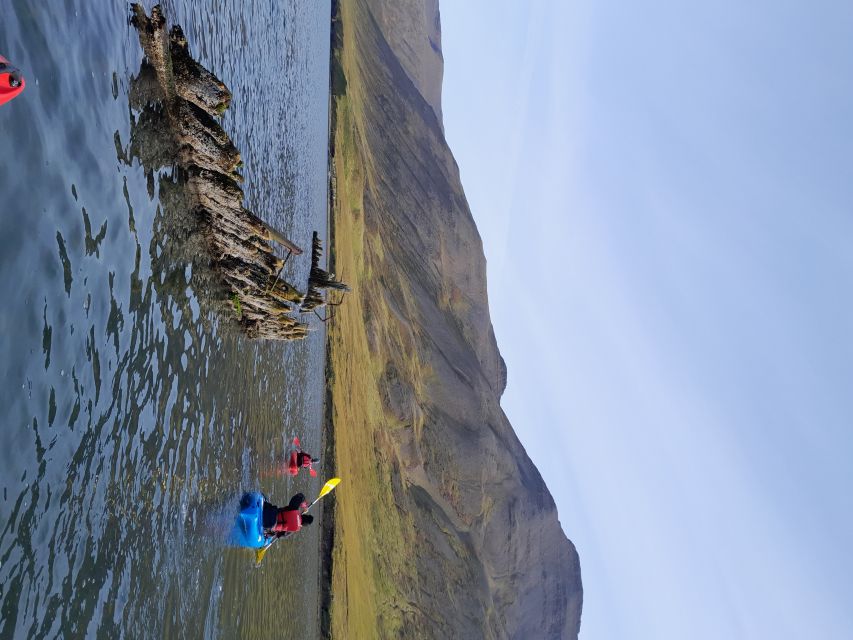 Siglufjörður / Siglufjordur: Guided kayak tour. - The Evanger avalanche site and the 1919 story