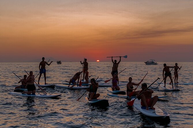 Small group paddle boarding tour to Bagni Regina Giovanna - Entering the emerald pool at Bagni Regina Giovanna