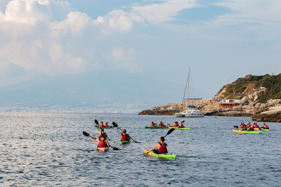 Sorrento: Premium Kayaking Experience with Swimming - Paddling beneath Sorrento’s cliffs