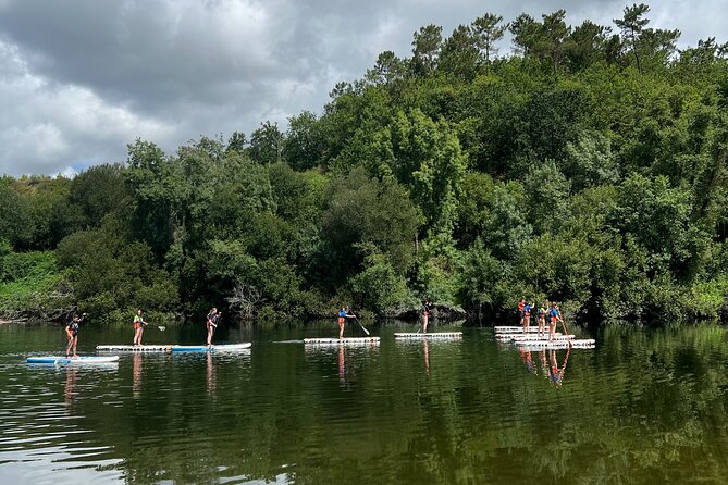 Stand Up Paddle Tour - Paddling through the Lima River scenery