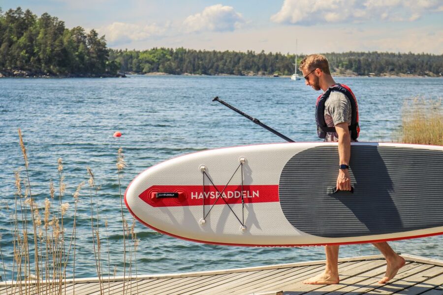Stockholm: City Highlights Self-Guided SUP Tour - Seeing City Hall from the water