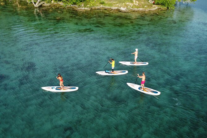 Sunrise on Paddleboard with breakfast in the lagoon of 7 colors - Getting onto the water with a small group