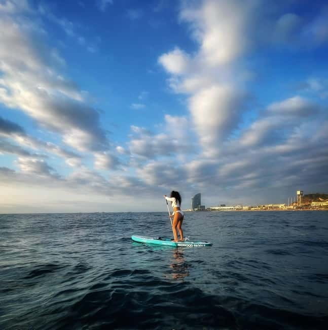 Sunset+paddle surf with music+fotos&videos Barceloneta+snack - Why sunset paddle surf changes the Barceloneta experience
