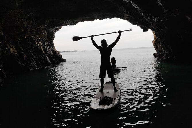 SUP Excursion in Polignano a Mare - Entering a sea cave