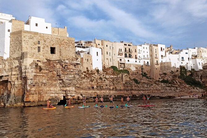 SUP in Polignano : Guided Excursions or Free Hire - Cala Paura and the view back to town