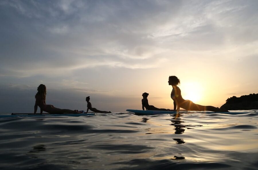 SUP Yoga in Stunning Stoja Bay: Balance, Breath & Connect - Paddling to the Yoga Buoy