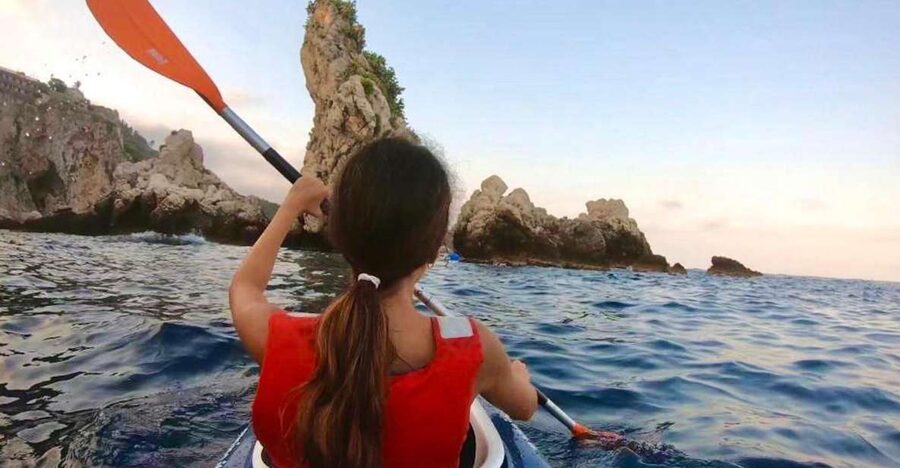 Taormina: Kayak Coastal Tour to Isola Bella and Blue Grotto - Starting beneath the Teocle Statue in Giardini Naxos