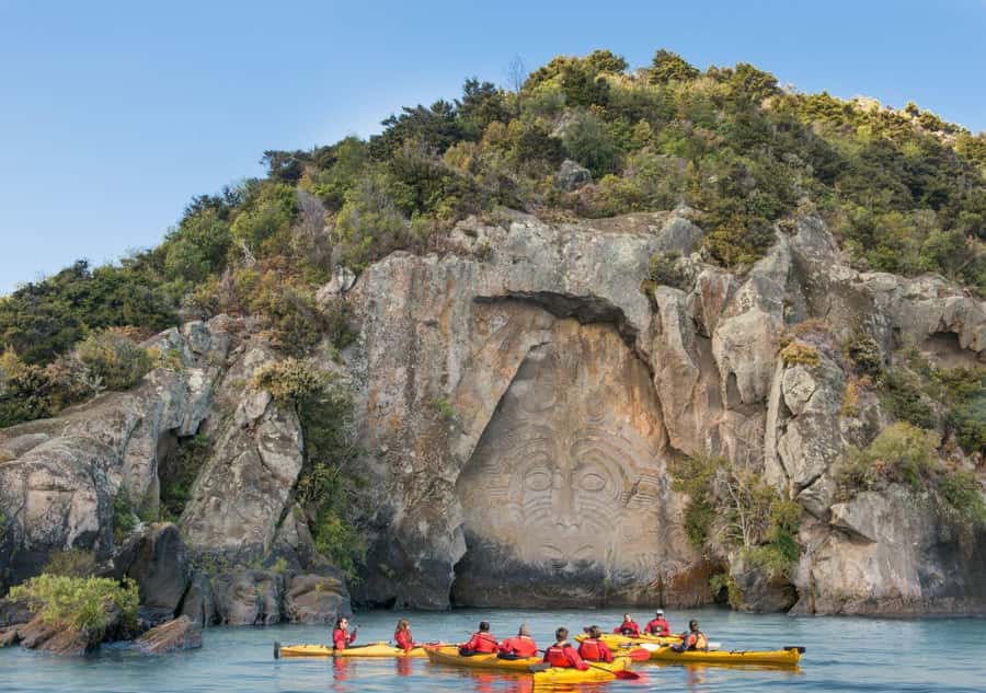 Taupo: Maori Rock Carvings Kayaking Tour - Learning local stories from Glen, Eloise, and the guide team